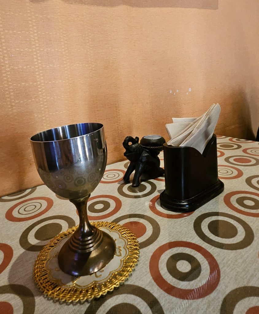 table with an iron cup